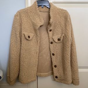 fluffy tan colored jacket